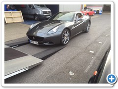 Nice modern Ferrari fresh from a service and on it?s way home.