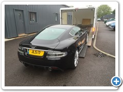 Aston Martin DBS transported into the Heritage Service Centre
